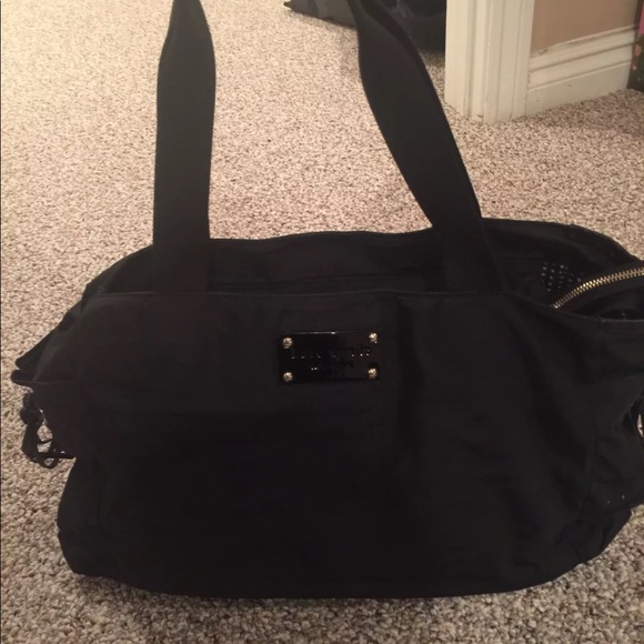Kate spade diaper bag with changing pad