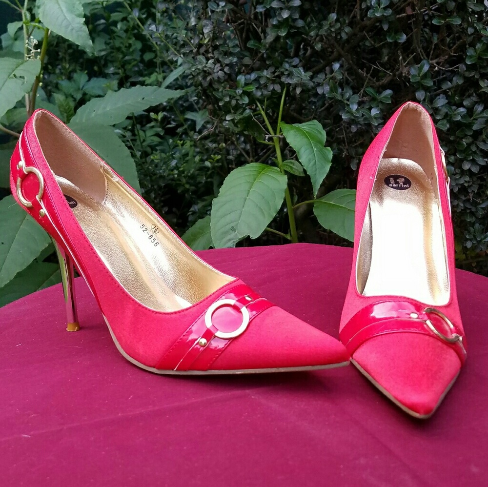 Red satin pumps with gold accents