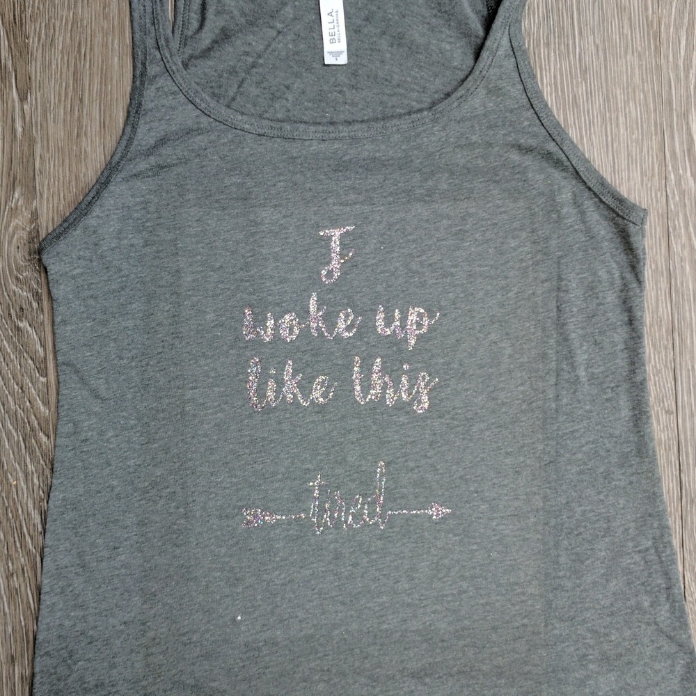 I woke up like this...tired. Tank top.
