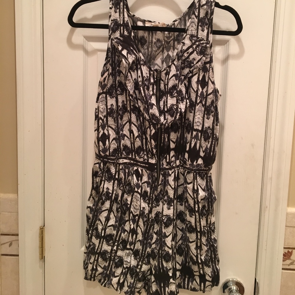 Black and white front zip romper