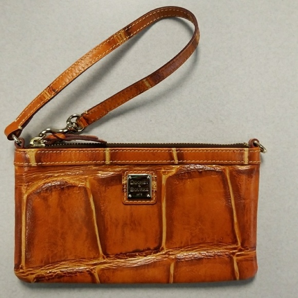 Dooney & Bourke Handbags - 💥💥SOLD⭐FREE⭐Dooney & Bourke wristlet (Authentic)