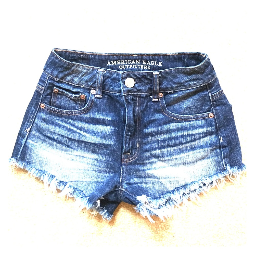 Frayed blue jean shorts