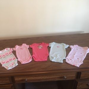 Carter's like new newborn onesies