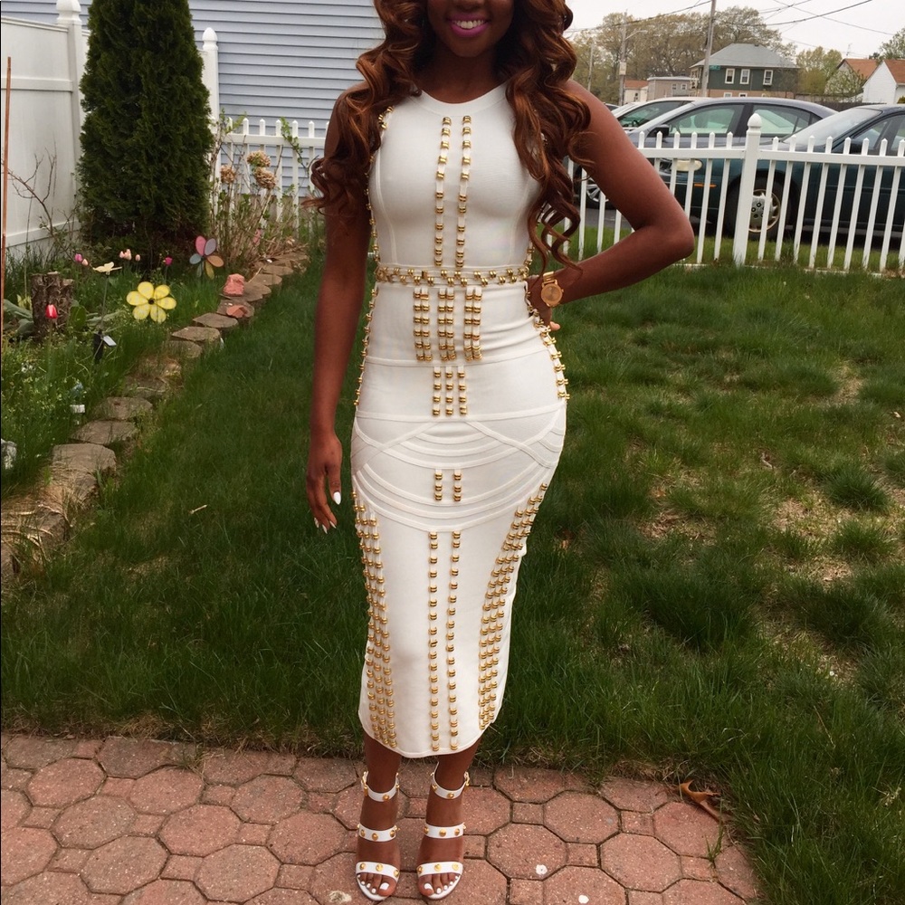 Lovely White and gold , gold pieces bandage dress