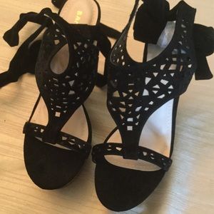 Women's black wrap style wedges