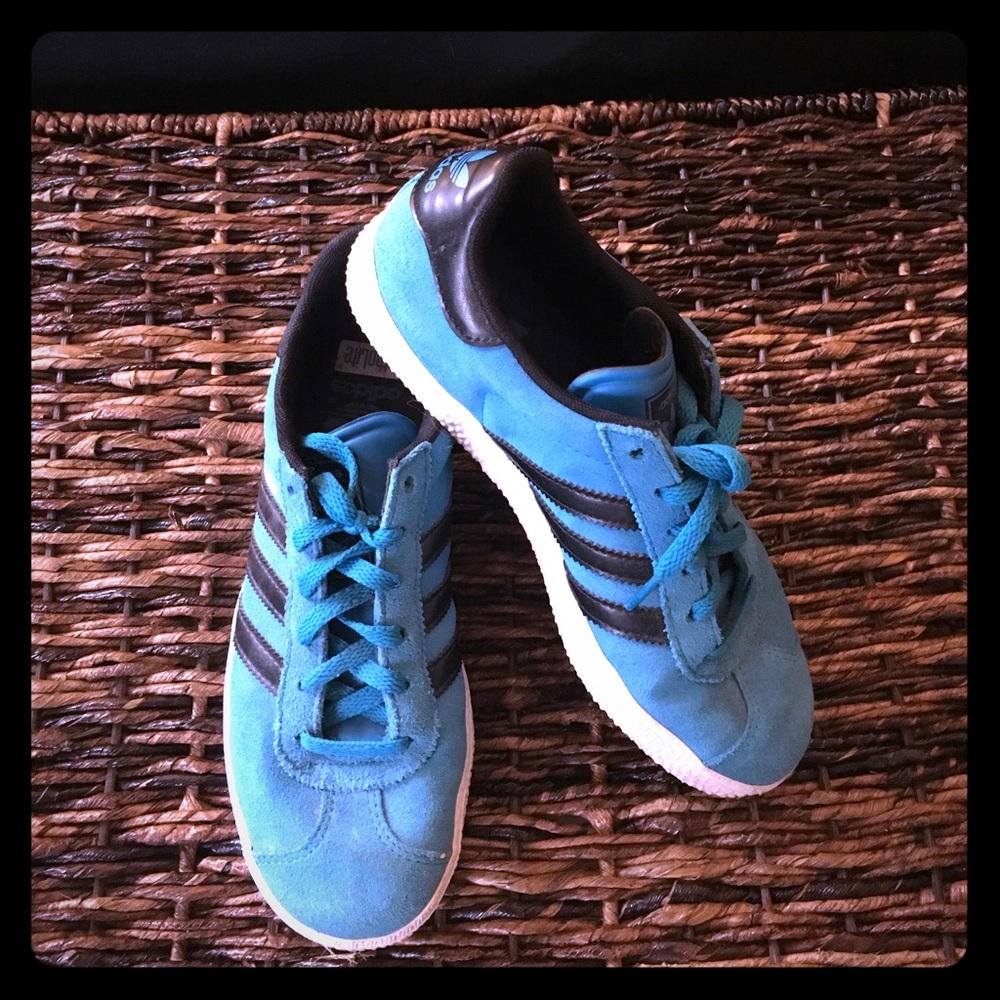 Blue and black Gazelle Adidas sneakers