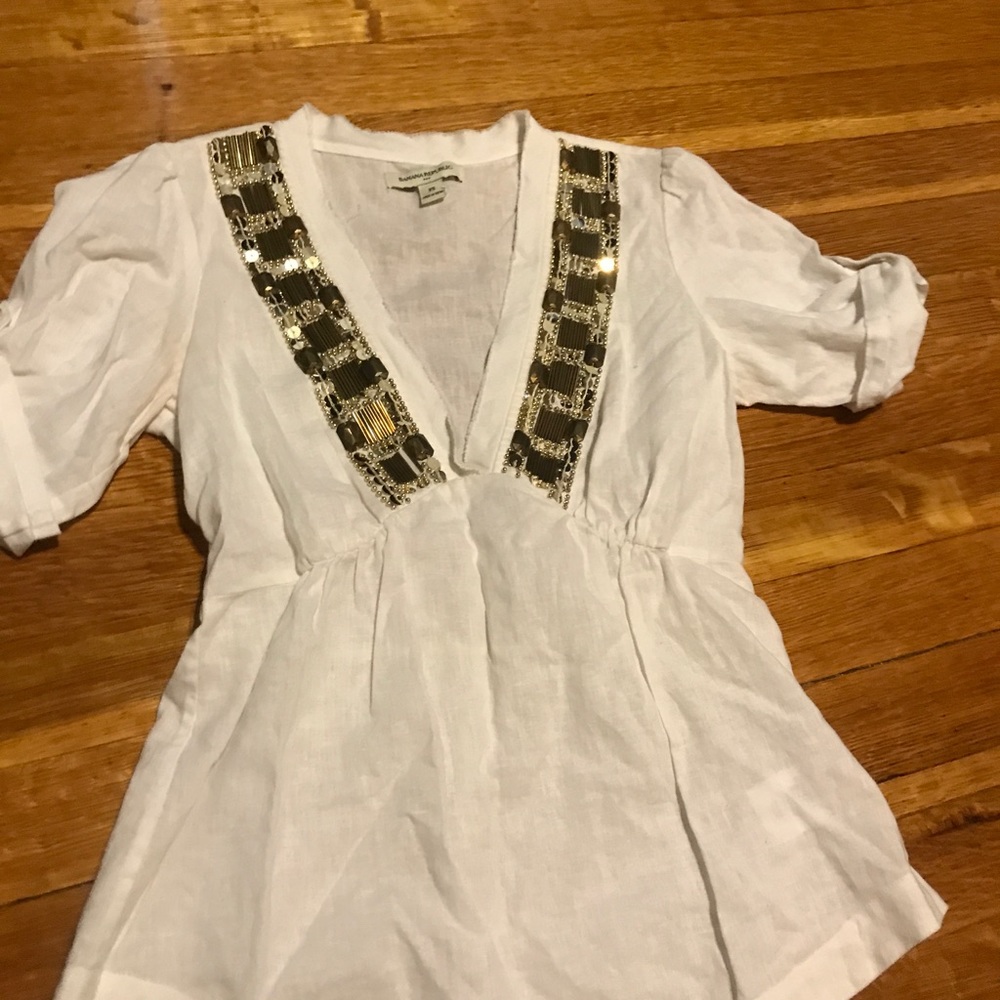 White linen shirt with gold detail