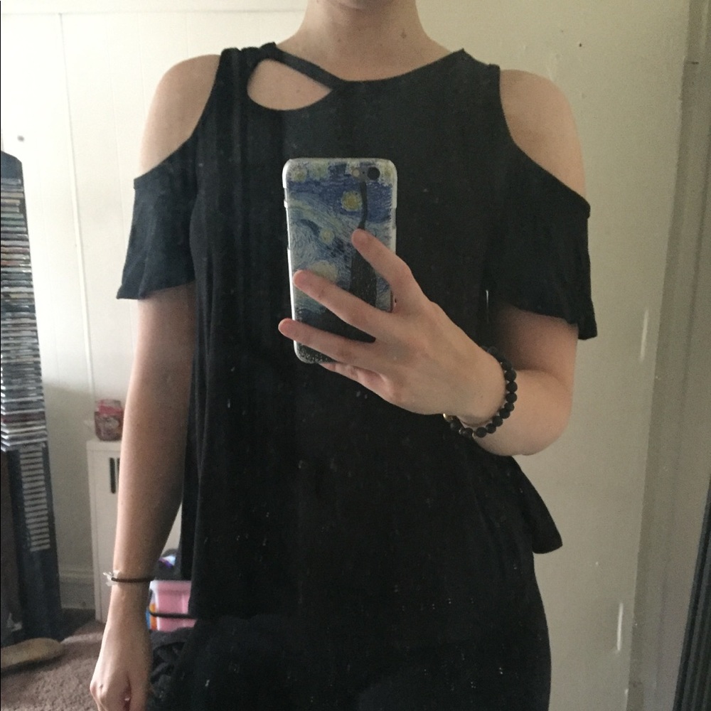Black shoulder revealing shirt