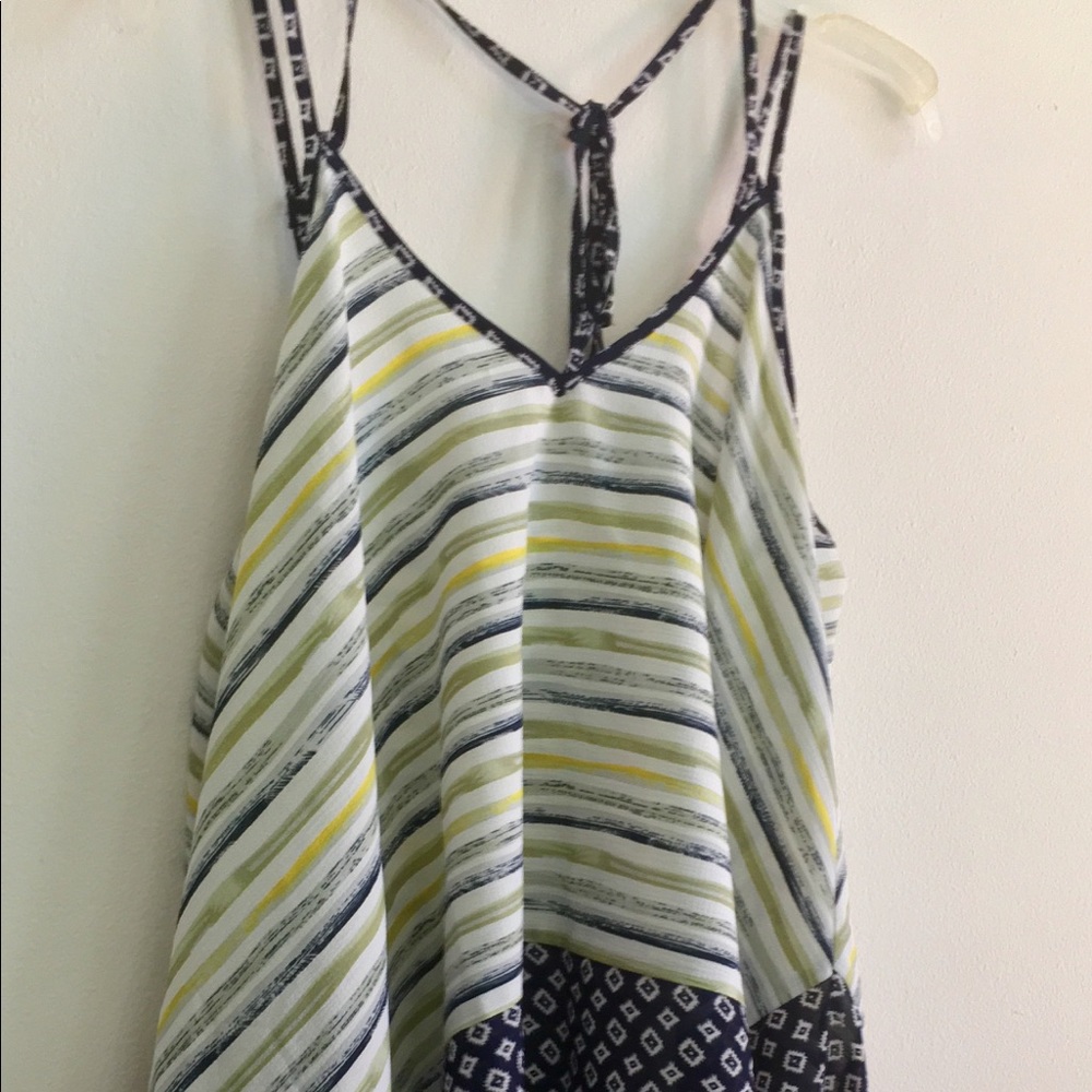 Handkerchief hem flowy blouse.