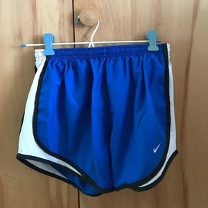 Blue Nike dry fit shorts.