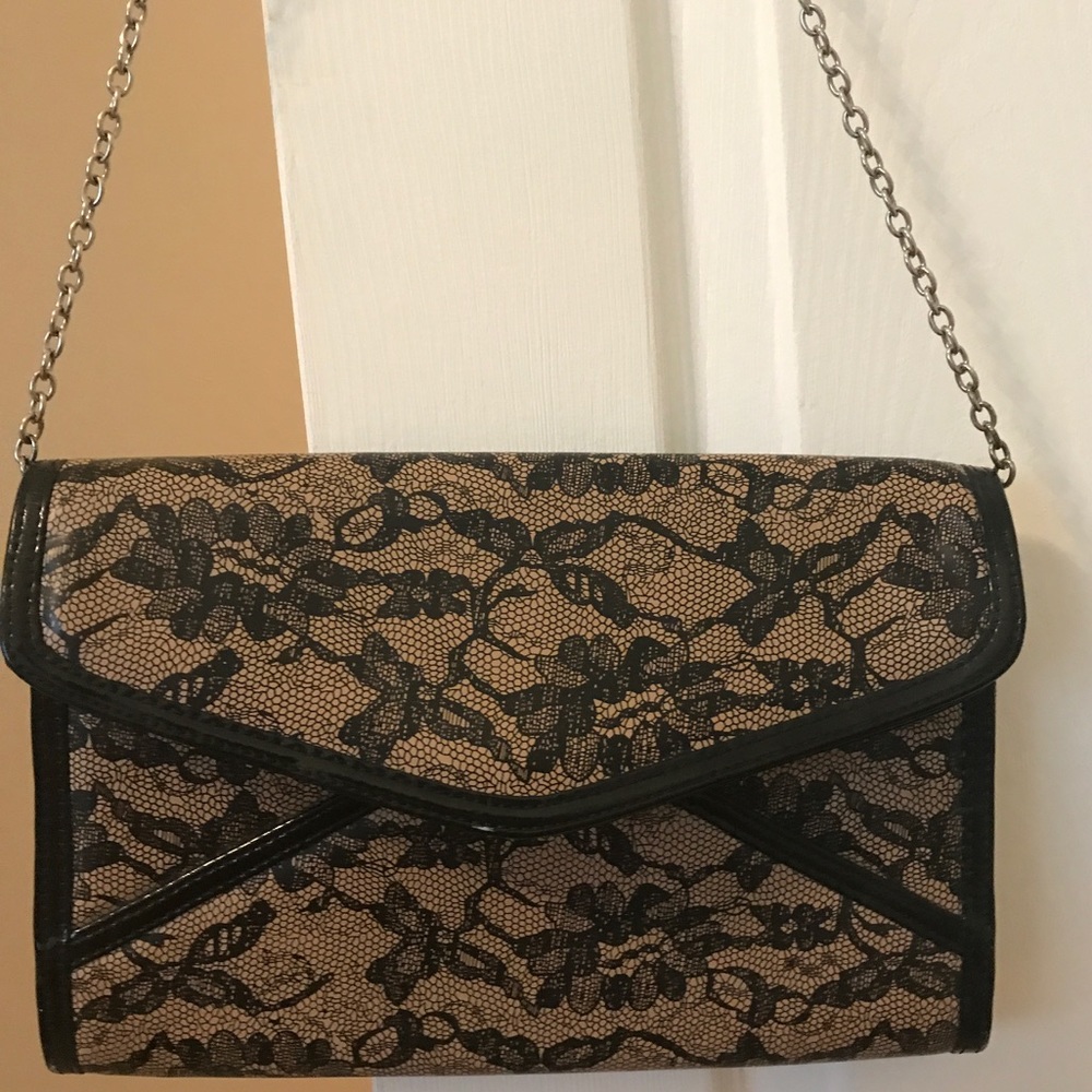 Aldo lace print nude and black clutch 👛