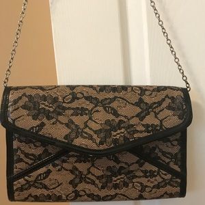 Aldo lace print nude and black clutch 👛