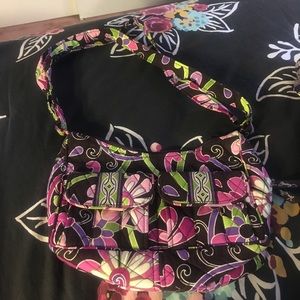 Shoulder bag with outside and interior pockets