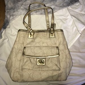 Tan and gold Coach Purse