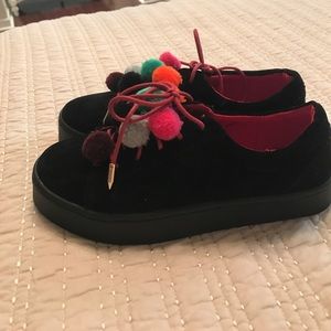 Black platform sneakers