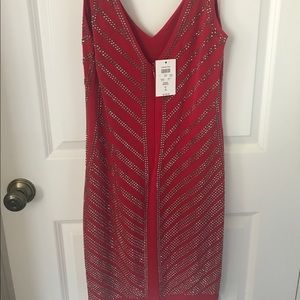 Red cache dress that fits like a glove!