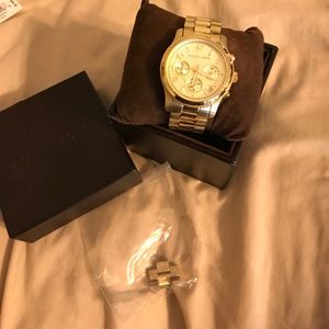 Gold MK watch