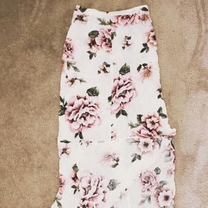 Long floral skirt with a side slit.
