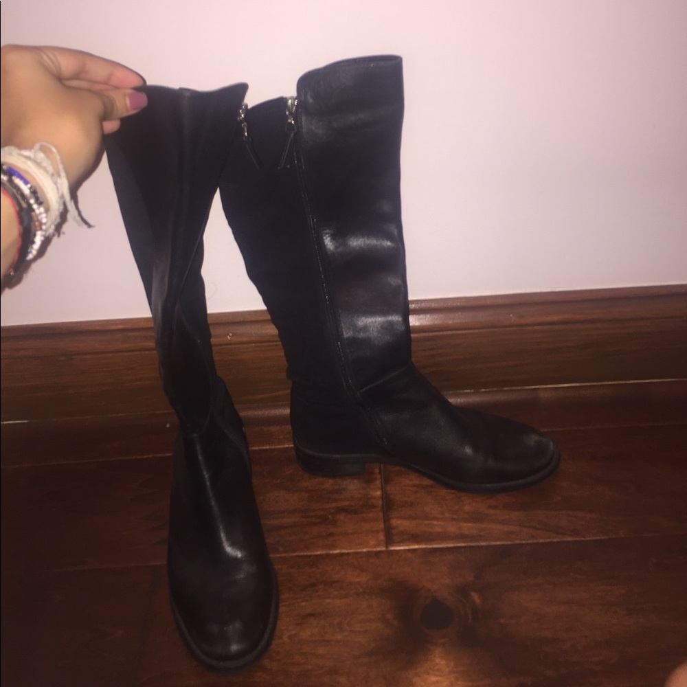 Black knee length leather boots with elastic back