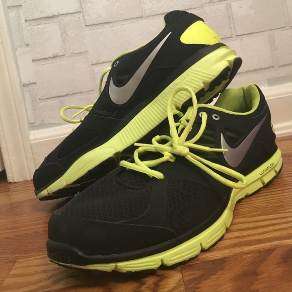 black and yellow nike running shoes