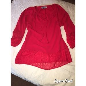 Red blouse with tassels