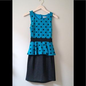 Cute polka dot peplum dress.  Never worn tags on