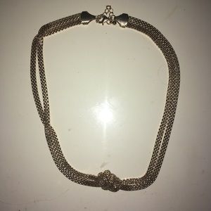 A set of three gold necklaces.