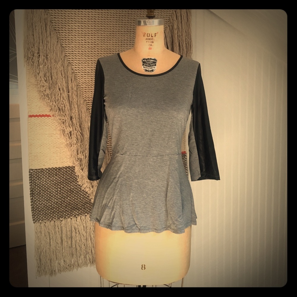 Quarter length shirt with pleather sleeves