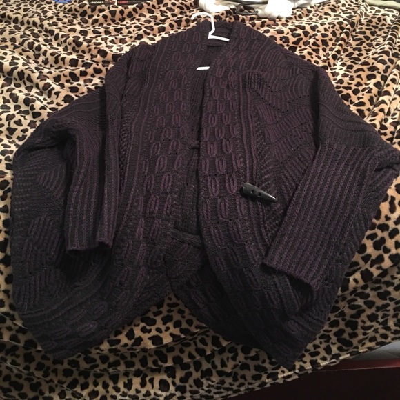 Purple and black sweater. - Picture 1 of 2