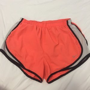 Orange and black Nike tempo shorts