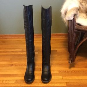 Over the knee black boots