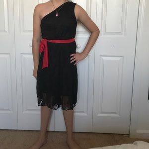 Black dress with red tie