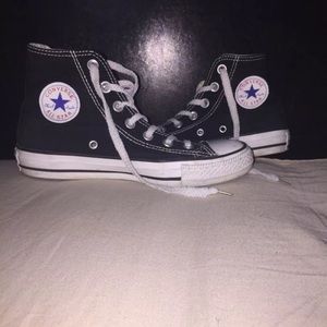Black and white high top converse