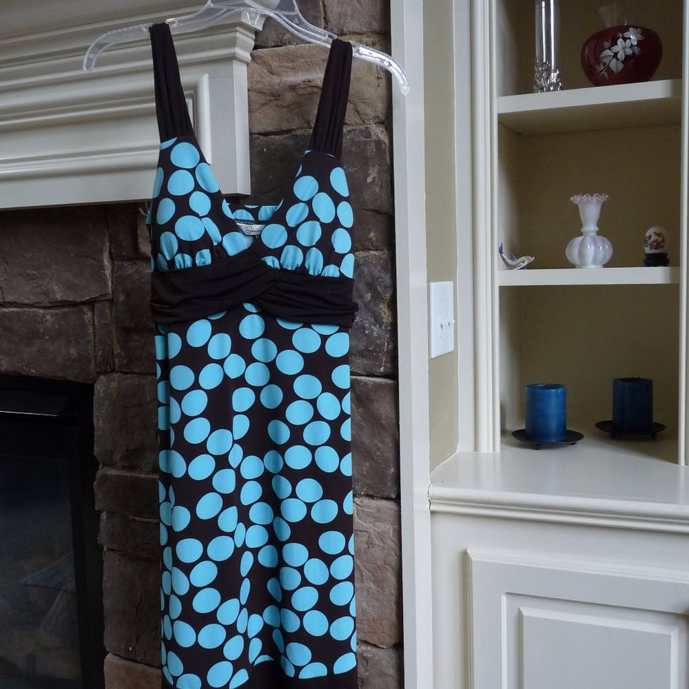 sleeveless brown dress with teal polka dots