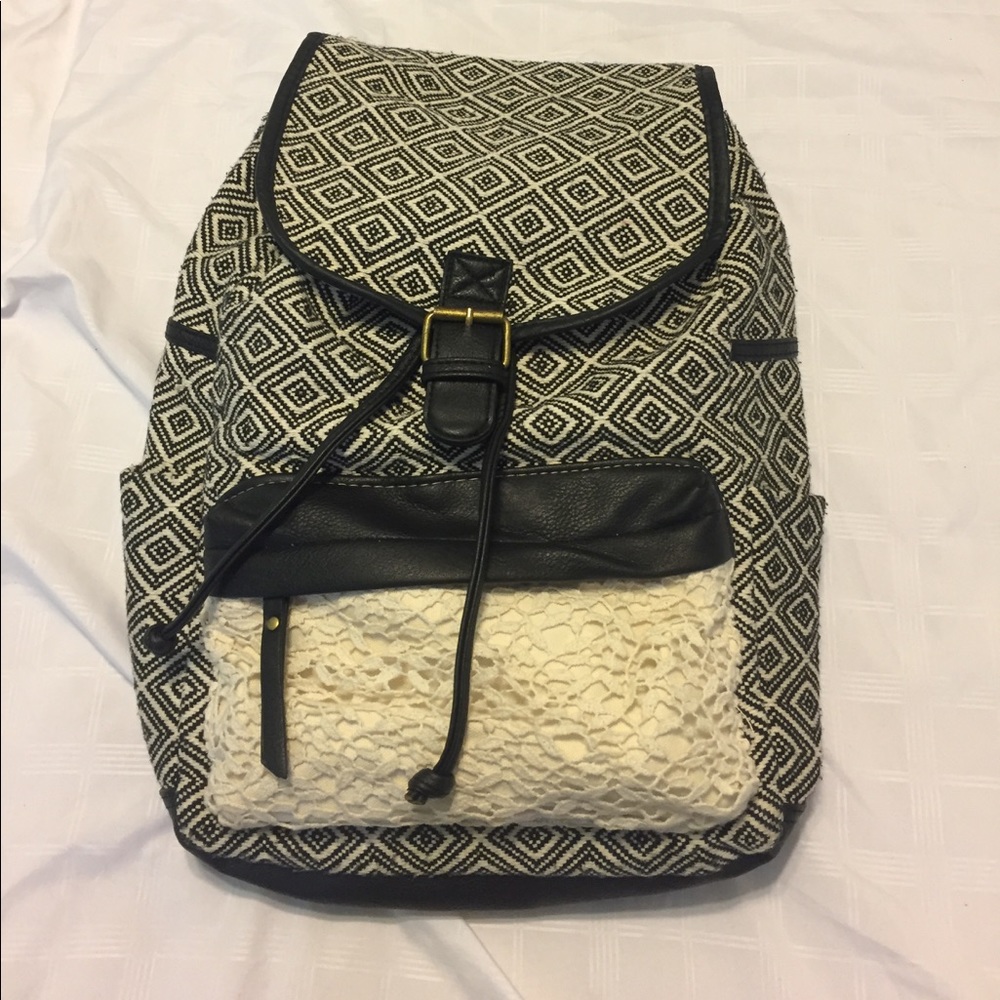 Black And Cream Patterned Backpack - image 1
