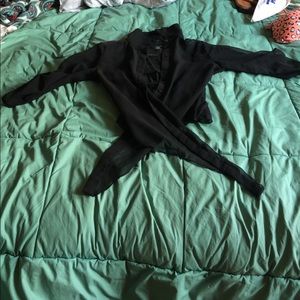 Sheer black blouse with lace detailing