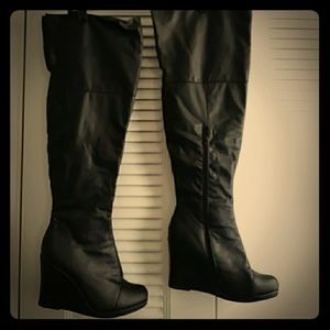 Over the knee wedge boots