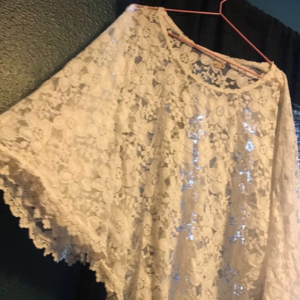 See threw flower printed pancho from Hollister.