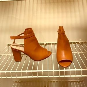 Tan block heels.