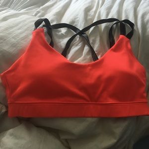 Strappy hot pink sports bra