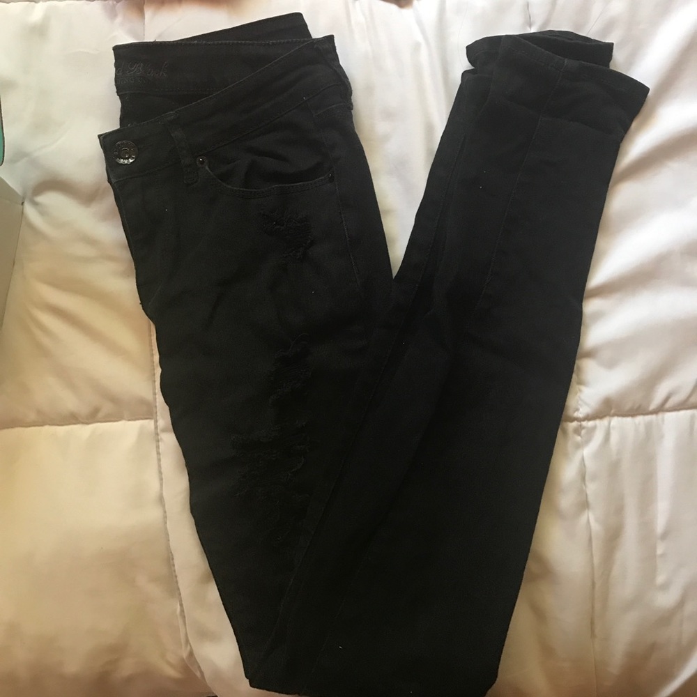 Black skinny distressed jeans