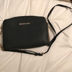 Black Michael Kors purse.