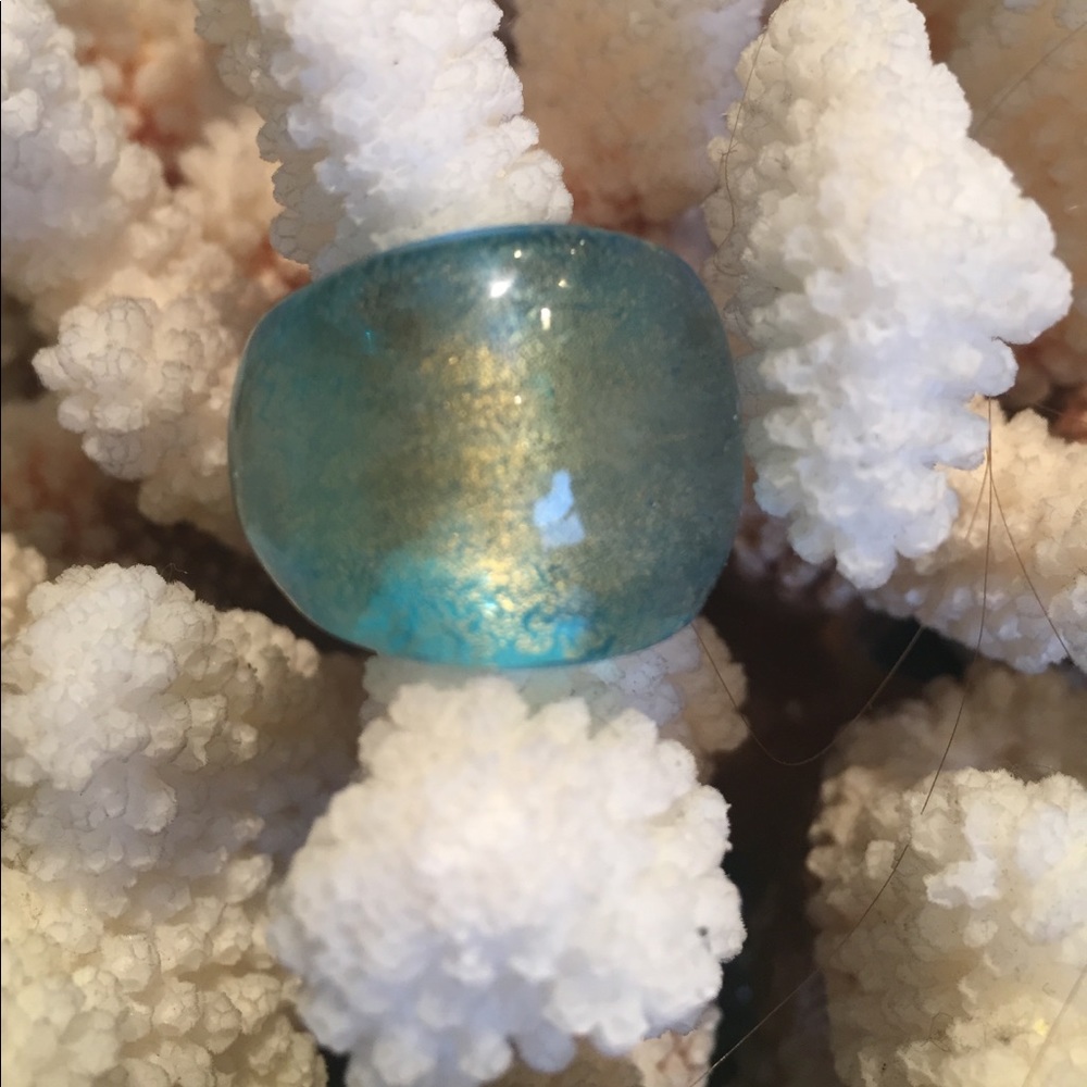 Iridescent mermaid ring.