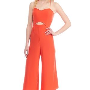 Orange red lace up back jumpsuit