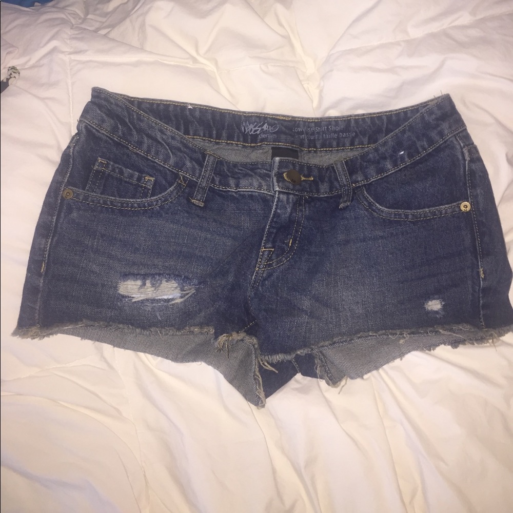 Distressed low rise jean shorts