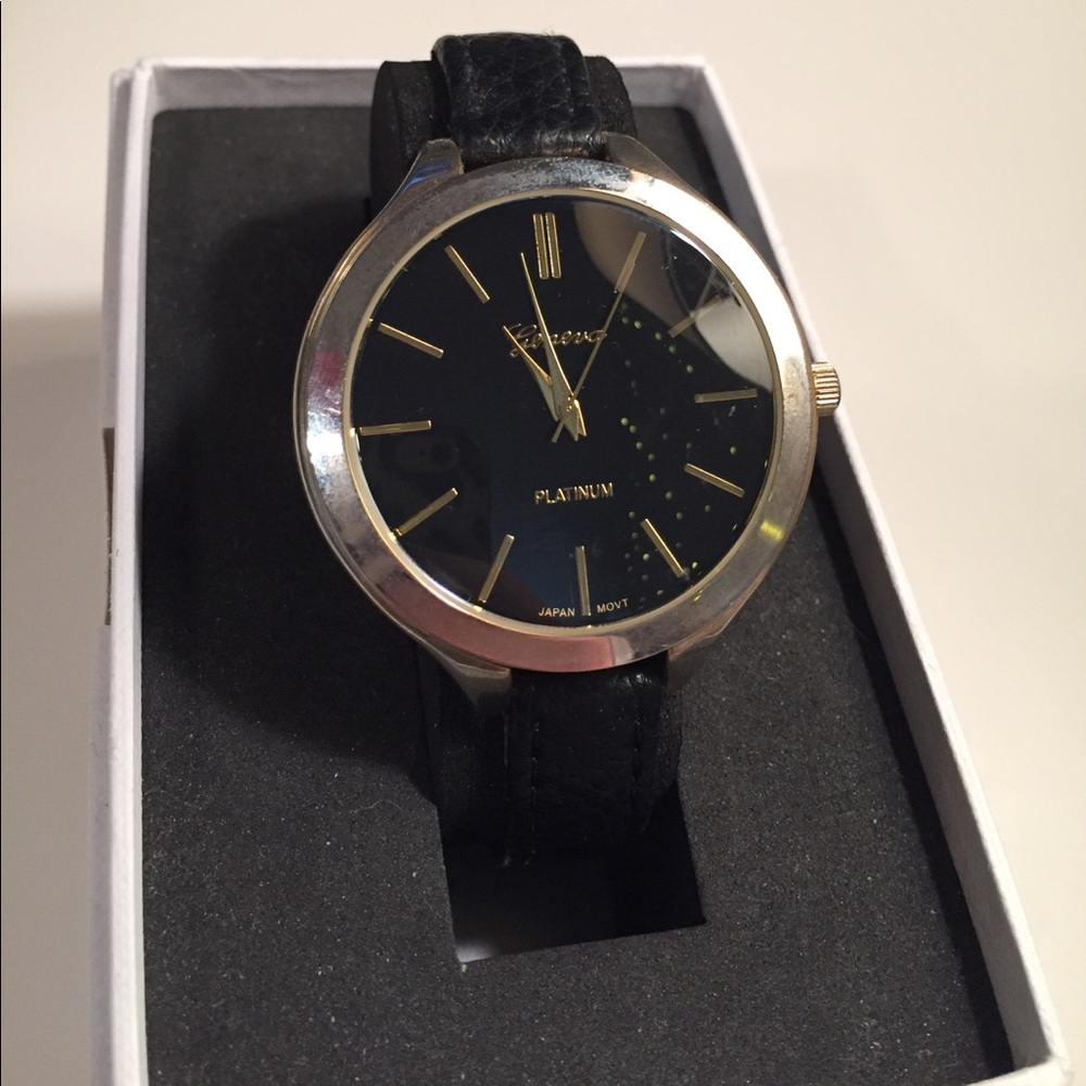 geneva platinum black & gold watch