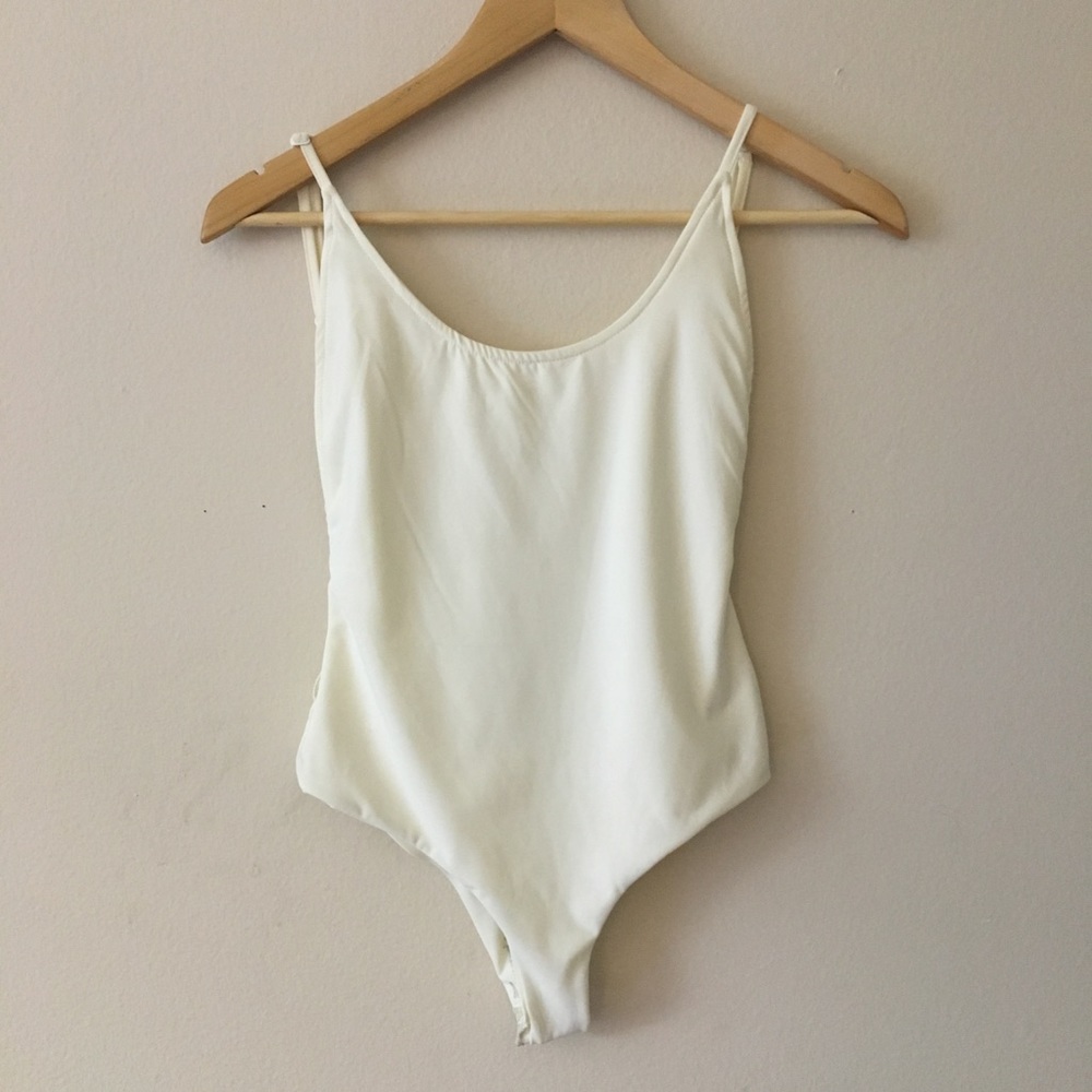 White one piece bathing suit.