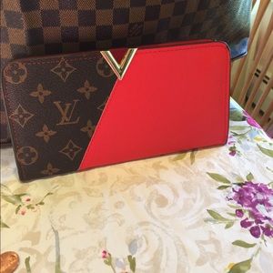 Brown canvas red leather wallet