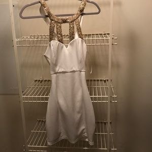 White and gold dress.