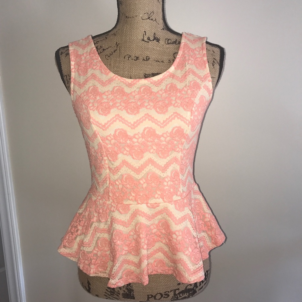 Lacey peplum top with plunge v-neck back